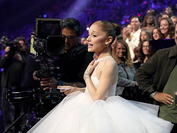 Ariana Grande accepts the award for Video of the Year for "Brighter Days Ahead" on stage during the 2025 MTV Video Music Awards at UBS Arena on September 07, 2025 in Elmont, New York. — frame 187/246 (612×459)