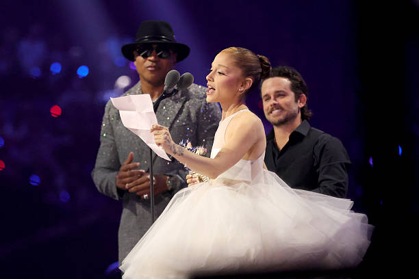 Ariana Grande accepts the award for Video of the Year for "Brighter Days Ahead" on stage during the 2025 MTV Video Music Awards at UBS Arena on September 07, 2025 in Elmont, New York. — frame 125/246 (612×408)