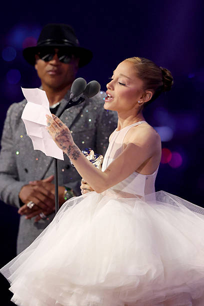 Ariana Grande accepts the award for Video of the Year for "Brighter Days Ahead" on stage during the 2025 MTV Video Music