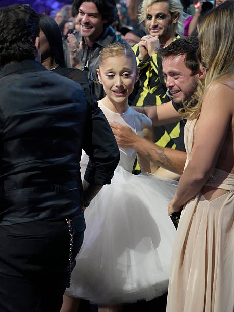 Ariana Grande accepts the award for Video of the Year for "Brighter Days Ahead" on stage during the 2025 MTV Video Music Awards at UBS Arena on September 07, 2025 in Elmont, New York. — frame 188/246 (459×612)