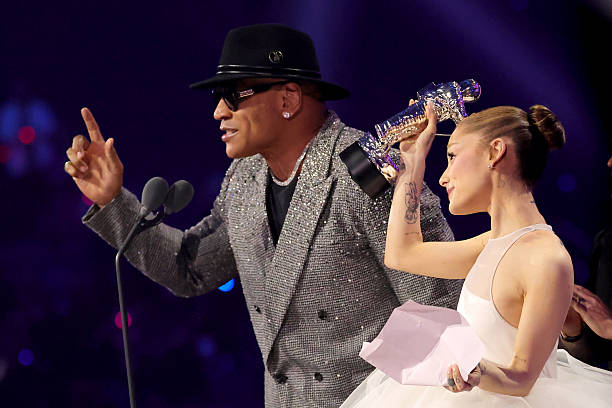 Ariana Grande accepts the award for Video of the Year for "Brighter Days Ahead" from LL Cool J on stage during the 2025 MTV Video Music Awards at UBS Arena on September 07, 2025 in Elmont, New York. (612×408)