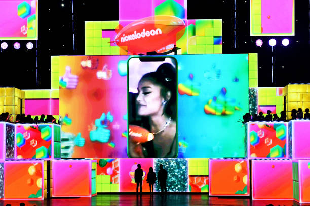 Ariana Grande accepts the awards for Favorite Female Artist and Favorite Song for "Thank U, Next" during Nickelodeon's 2