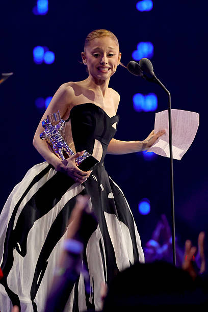 Ariana Grande accepts the Best Pop Award for “Brighter Days Ahead” during the 2025 MTV Video Music Awards at UBS Arena o
