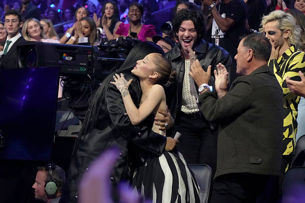 Ariana Grande accepts the Best Pop Award for “Brighter Days Ahead” onstage during the 2025 MTV Video Music Awards at UBS Arena on September 07, 2025 in Elmont, New York. — frame 245/246 (612×408)