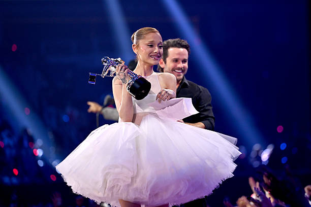 Ariana Grande and Christian Breslauer accept the Video of the Year Award for “Brighter Days Ahead” onstage during the 20
