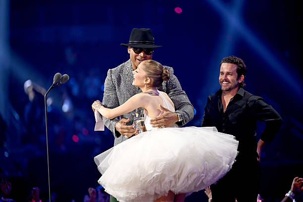 Ariana Grande and Christian Breslauer accept the Video of the Year Award for “Brighter Days Ahead” from LL Cool J during the 2025 MTV Video Music Awards at UBS Arena on September 07, 2025 in Elmont, New York. — frame 145/246 (612×408)