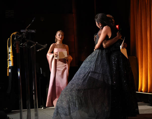 Ariana Grande and Cynthia Erivo accept the NBR Spotlight Award: Creative Collaboration for "Wicked" from Michelle Yeoh o