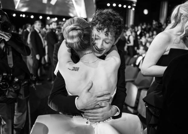 Ariana Grande and Ethan Slater attend the 97th Annual Oscars at Dolby Theatre on March 02, 2025 in Hollywood, California. — frame 144/202 (612×437)