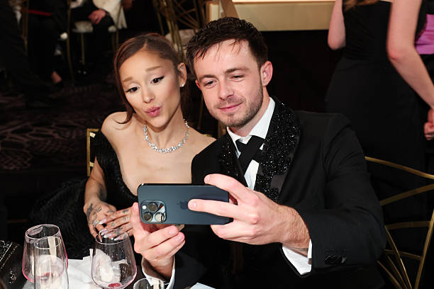 Ariana Grande and Kevin Csolak at the 83rd Annual Golden Globes held at The Beverly Hilton on January 11, 2026 in Beverl