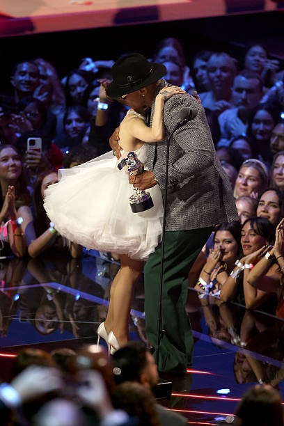 Ariana Grande and LL Cool J onstage during the 2025 MTV Video Music Awards at UBS Arena on September 07, 2025 in Elmont, New York. — frame 109/246 (408×612)