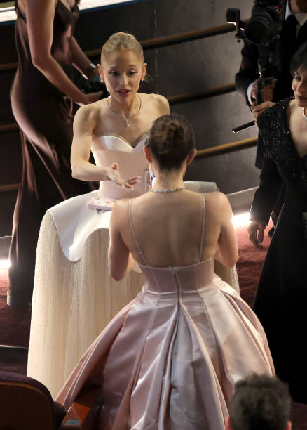 Ariana Grande and Monica Barbaro are seen during the 97th Annual Oscars at Dolby Theatre on March 02, 2025 in Hollywood,