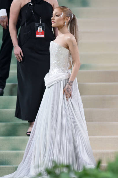 Ariana Grande at the 2024 Met Gala Celebrating "Sleeping Beauties: Reawakening Fashion" at The Metropolitan Museum of Art on May 06, 2024 in New York City. — frame 19/93 (408×612)