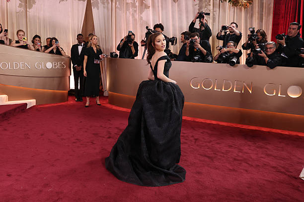 Ariana Grande at the 83rd Annual Golden Globes held at The Beverly Hilton on January 11, 2026 in Beverly Hills, California. — frame 82/147 (612×408)