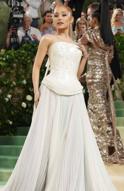 Ariana Grande attends The 2024 Met Gala Celebrating "Sleeping Beauties: Reawakening Fashion" at The Metropolitan Museum of Art on May 06, 2024 in New York City. — frame 75/93 (396×612)