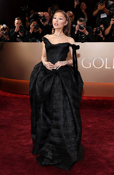 Ariana Grande attends the 83rd Annual Golden Globe Awards at The Beverly Hilton on January 11, 2026 in Beverly Hills, California. — frame 15/135 (399×612)