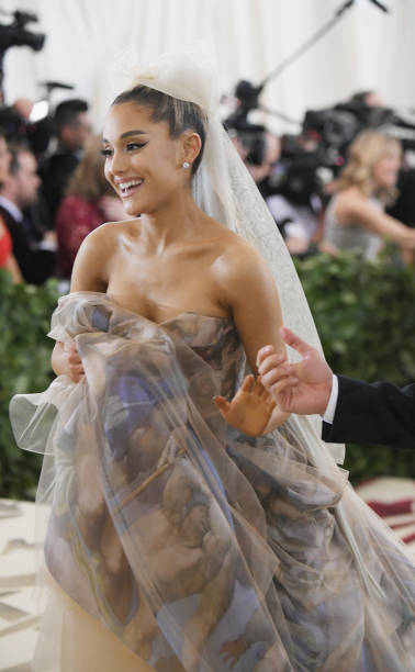 Ariana Grande attends the Heavenly Bodies: Fashion & The Catholic Imagination Costume Institute Gala at The Metropolitan Museum of Art on May 7, 2018 in New York City. (378×612)