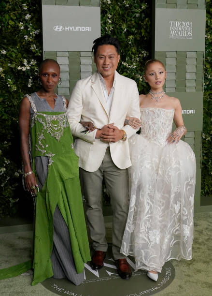 British actress and singer Cynthia Erivo, US film director Jon M. Chu, and US singer Ariana Grande attend the Wall Street Journal Magazine's Innovator awards at the Museum of Modern Art in New York, October 29, 2024. — frame 1/4 (439×612)