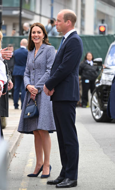 Catherine, Duchess of Cambridge and Prince WIlliam, Duke of Cambridge attend the official opening of the Glade of Light Memorial at Manchester Cathedral on May 10, 2022 in Manchester, England. The Glade of Light Memorial commemorates the victims of the terrorist attack that took place after an Ariana Grande concert at Manchester Arena on May 22, 2017. (371×612)