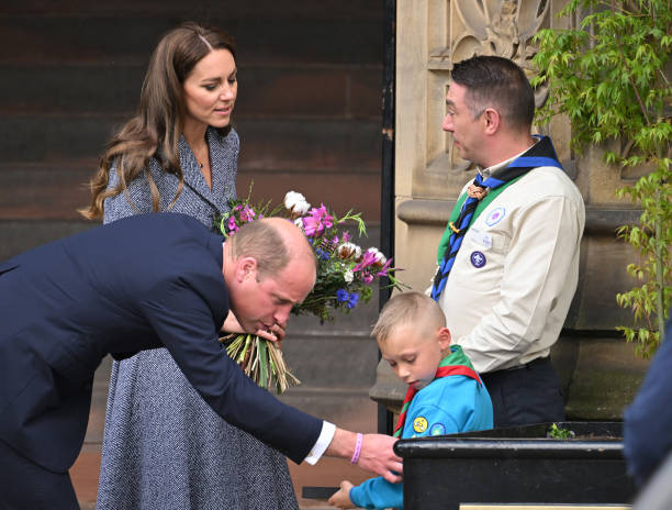 Catherine, Duchess of Cambridge and Prince William, Duke of Cambridge depart after attending the official opening of the Glade of Light Memorial at Manchester Cathedral on May 10, 2022 in Manchester, England. The Glade of Light Memorial commemorates the victims of the terrorist attack that took place after an Ariana Grande concert at Manchester Arena on May 22, 2017. (612×464)