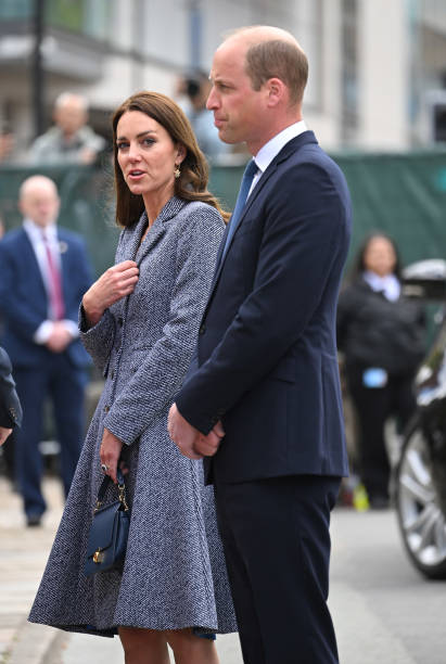 Catherine, Duchess of Cambridge and Prince WIlliam, Duke of Cambridge attend the official opening of the Glade of Light Memorial at Manchester Cathedral on May 10, 2022 in Manchester, England. The Glade of Light Memorial commemorates the victims of the terrorist attack that took place after an Ariana Grande concert at Manchester Arena on May 22, 2017. (411×612)