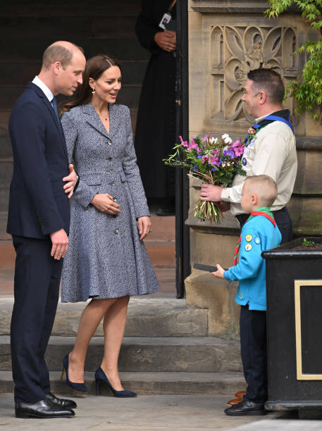 Catherine, Duchess of Cambridge and Prince William, Duke of Cambridge depart after attending the official opening of the Glade of Light Memorial at Manchester Cathedral on May 10, 2022 in Manchester, England. The Glade of Light Memorial commemorates the victims of the terrorist attack that took place after an Ariana Grande concert at Manchester Arena on May 22, 2017. (457×612)