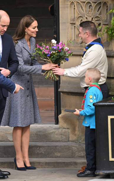 Catherine, Duchess of Cambridge and Prince William, Duke of Cambridge depart after attending the official opening of the Glade of Light Memorial at Manchester Cathedral on May 10, 2022 in Manchester, England. The Glade of Light Memorial commemorates the victims of the terrorist attack that took place after an Ariana Grande concert at Manchester Arena on May 22, 2017. — frame 35/51 (386×612)