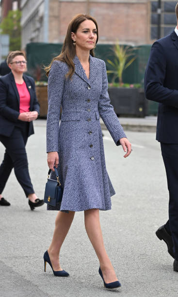 Catherine, Duchess of Cambridge attends the official opening of the Glade of Light Memorial with Prince William, Duke of Cambridge at Manchester Cathedral on May 10, 2022 in Manchester, England. The Glade of Light Memorial commemorates the victims of the terrorist attack that took place after an Ariana Grande concert at Manchester Arena on May 22, 2017. (367×612)