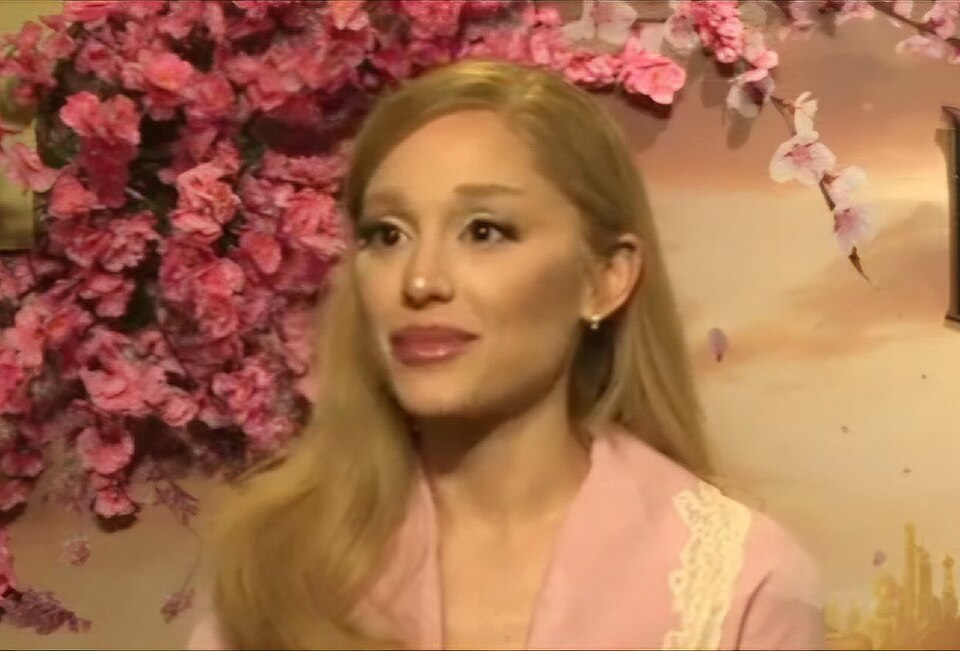 Ariana Grande during an interview to promote Wicked (2024) — frame 28/31 (1297×880)
