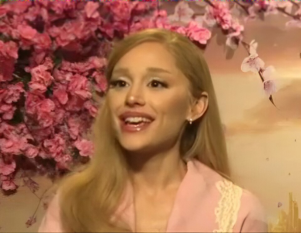 Ariana Grande during an interview to promote Wicked (2024) — frame 26/31 (1148×888)