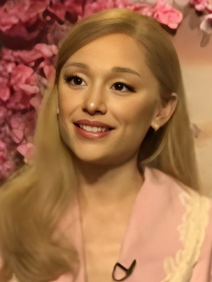 Ariana Grande during an interview to promote Wicked (2024) — frame 18/18 (303×403)