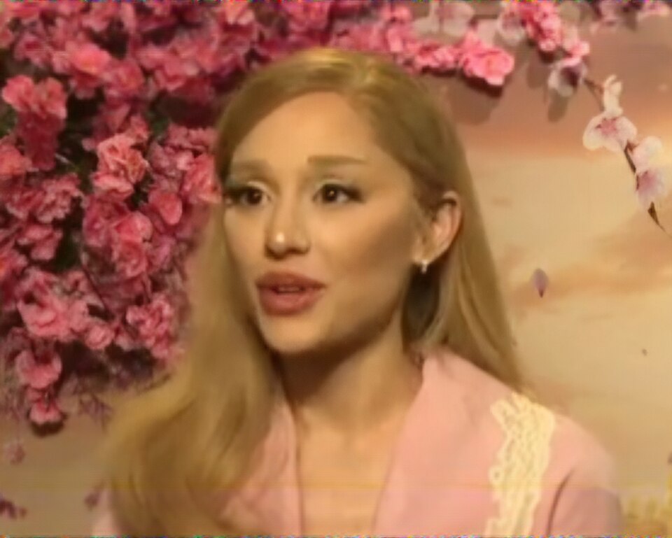 Ariana Grande during an interview to promote Wicked (2024) — frame 25/31 (1108×888)