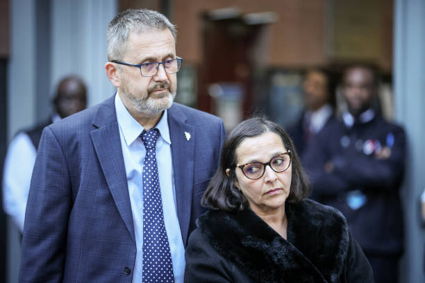 Figen Murray, the mother of Martyn Hett, with with her husband Dr Stuart Murray, peaks to the media outside Manchester Magistrates Court following the publication of the Manchester Arena Inquiry volume two report on emergency services response, which examines whether any inadequacies in the services' response contributed to individual deaths. Twenty-two people were killed and hundreds were injured in a suicide attack at the end of an Ariana Grande concert on May 22 2017. (612×408)