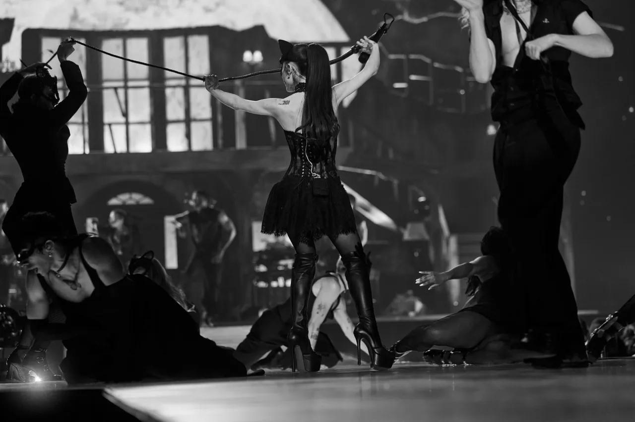 Ariana Grande in Christian Louboutin Tour Boots