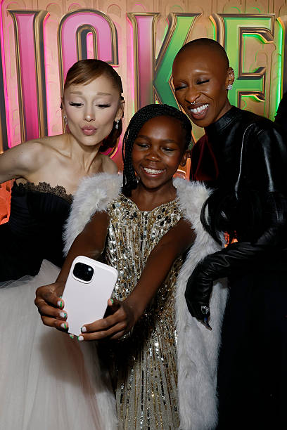 Ariana Grande, Karis Musongole and Cynthia Erivo attend as Universal Pictures proudly presents the WICKED FOR GOOD US Premiere on November 17, 2025 in New York City. (408×612)
