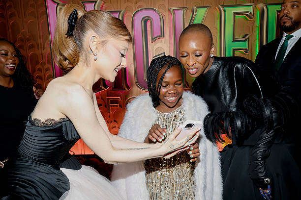 Ariana Grande, Karis Musongole and Cynthia Erivo attend as Universal Pictures proudly presents the WICKED FOR GOOD US Premiere on November 17, 2025 in New York City. (612×408)