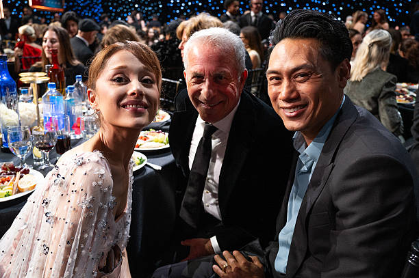 Ariana Grande, Marc Platt, and Jon M. Chu attend the 31st Annual Critics Choice Awards at Barker Hangar on January 04, 2026 in Santa Monica, California. (612×407)