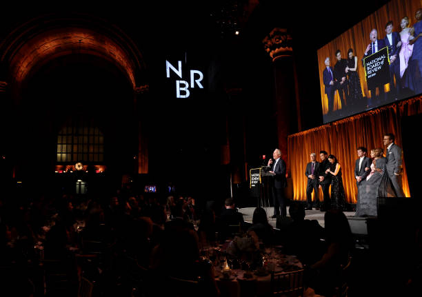 Marc Platt, David Nicksay, Jon M. Chu, Michelle Yeoh, Ethan Slater, Ariana Grande, and Cynthia Erivo accept the Best Film Award for "Wicked" from Ryan Reynolds onstage during The National Board of Review Annual Awards Gala at Cipriani 42nd Street on January 07, 2025 in New York City. — frame 41/110 (612×431)