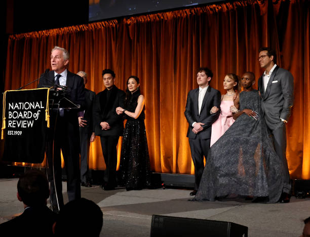 Marc Platt, Jon M. Chu, Michelle Yeoh, Ethan Slater, Ariana Grande, and Cynthia Erivo accept the Best Film Award for "Wicked" from Ryan Reynolds onstage during The National Board of Review Annual Awards Gala at Cipriani 42nd Street on January 07, 2025 in New York City. (612×468)