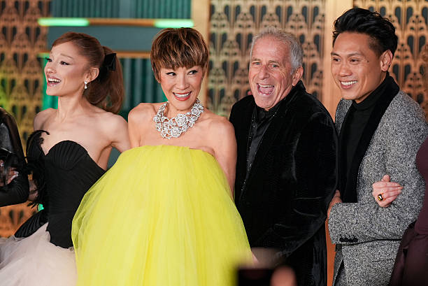 Ariana Grande, Michelle Yeoh, Marc E. Platt and Jon M. Chu at the "Wicked: For Good" New York Premiere held at Lincoln Center for the Performing Arts on November 17, 2025 in New York, New York. — frame 45/83 (612×409)