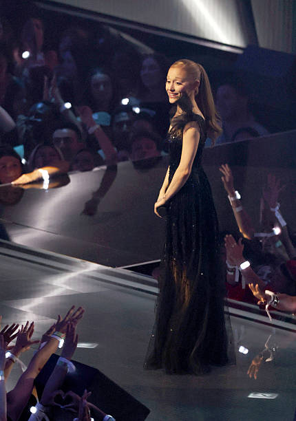 Ariana Grande performs during the 2025 MTV Video Music Awards at UBS Arena on September 07, 2025 in Elmont, New York. (430×612)