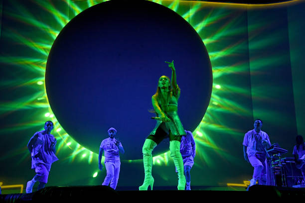 Ariana Grande performs on stage during her "Sweetener World Tour" at The O2 Arena on October 15, 2019 in London, England. — frame 1/20 (612×408)
