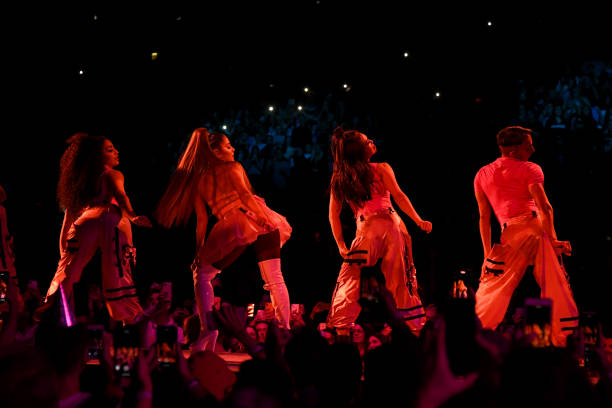 Ariana Grande performs on stage during her "Sweetener World Tour" at The O2 Arena on October 15, 2019 in London, England. — frame 3/20 (612×408)