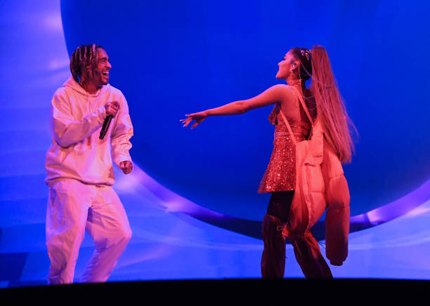 Ariana Grande performs on stage during her "Sweetener World Tour" with Mikey Foster of Social House at The O2 Arena on A