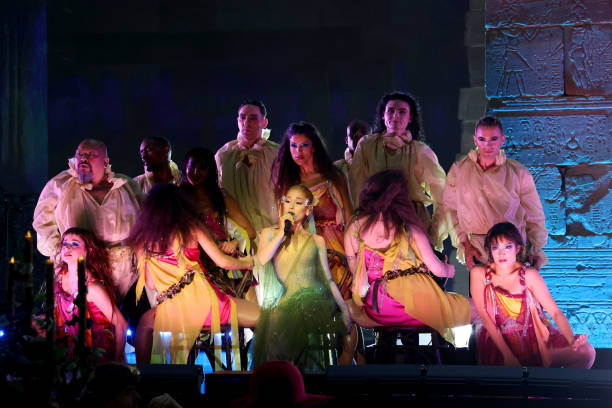 Ariana Grande performs onstage during The 2024 Met Gala Celebrating "Sleeping Beauties: Reawakening Fashion" at The Metropolitan Museum of Art on May 06, 2024 in New York City. — frame 159/236 (612×408)