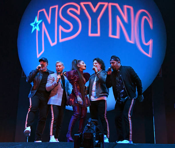 Ariana Grande performs onstage with members of NYSNC Joey Fatone, Lance Bass, JC Chasez, and Chris Kirkpatrick Coachella Stage during the 2019 Coachella Valley Music And Arts Festival on April 14, 2019 in Indio, California. (612×517)
