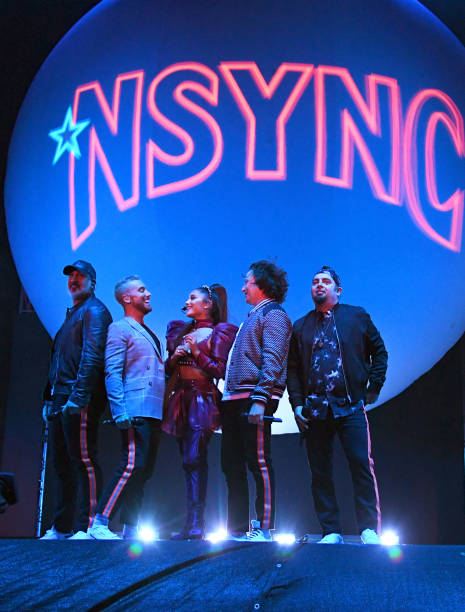 Ariana Grande performs onstage with members of NYSNC Joey Fatone, Lance Bass, JC Chasez, and Chris Kirkpatrick Coachella Stage during the 2019 Coachella Valley Music And Arts Festival on April 14, 2019 in Indio, California. (465×612)
