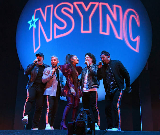 Ariana Grande performs onstage with members of NYSNC Joey Fatone, Lance Bass, JC Chasez, and Chris Kirkpatrick Coachella Stage during the 2019 Coachella Valley Music And Arts Festival on April 14, 2019 in Indio, California. (612×517)