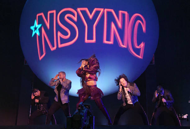 Ariana Grande performs with members of NSYNC Chris Kirkpatrick, Lance Bass, JC Chasez and Joey Fatone on Coachella Stage during the 2019 Coachella Valley Music And Arts Festival on April 14, 2019 in Indio, California. (612×415)