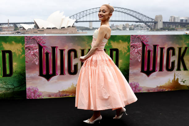 Ariana Grande poses for a photocall at Mrs Macquarie's Chair for the Australian premiere of "Wicked" at on November 05, 