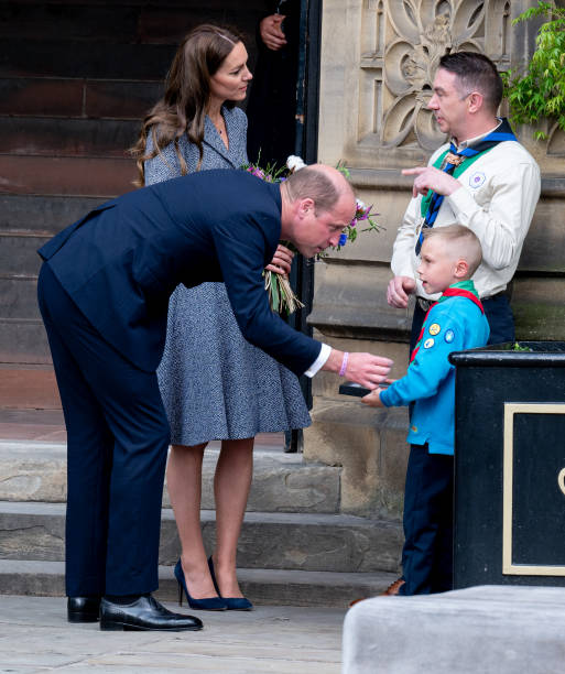 Prince William, Duke of Cambridge, and Catherine, Duchess of Cambridge, depart after attending the official opening of the Glade of Light Memorial at Manchester Cathedral on May 10, 2022 in Manchester, England. The Glade of Light Memorial commemorates the victims of the terrorist attack that took place after an Ariana Grande concert at Manchester Arena on May 22, 2017. — frame 25/51 (513×612)